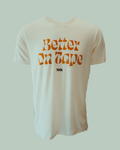 Cream colored short sleeve shirt with the words Better On Tape in orange letter. Small New Waltz logo below in black lettering.